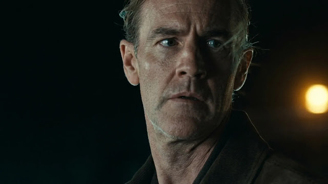 A night close-up of James Van Der Beek as Jacob in The Gates