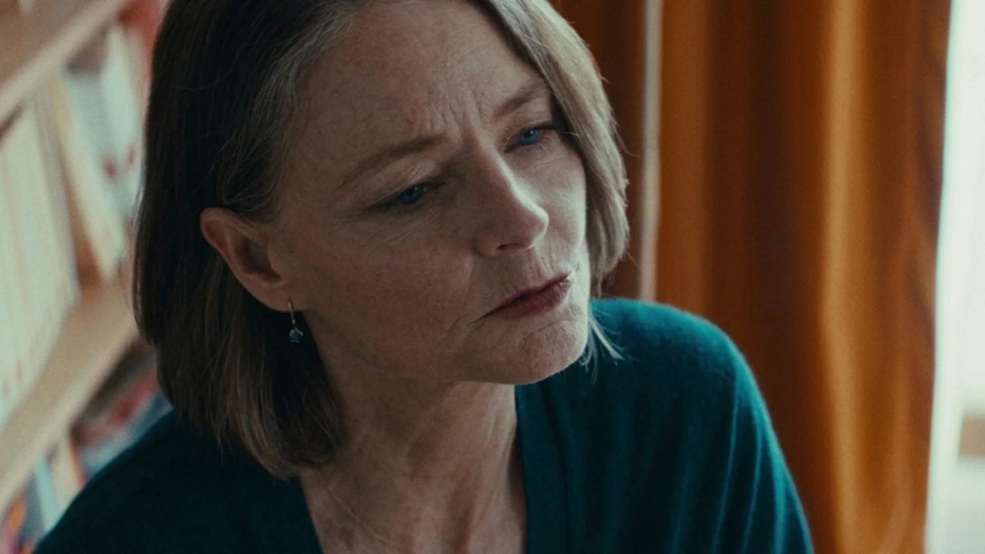 Close-up of Jodie Foster as Lilian Steiner in a teal top in A Private Life