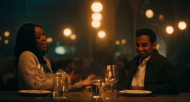 Aziz Ansari as Arj on a candlelit dinner date in Good Fortune