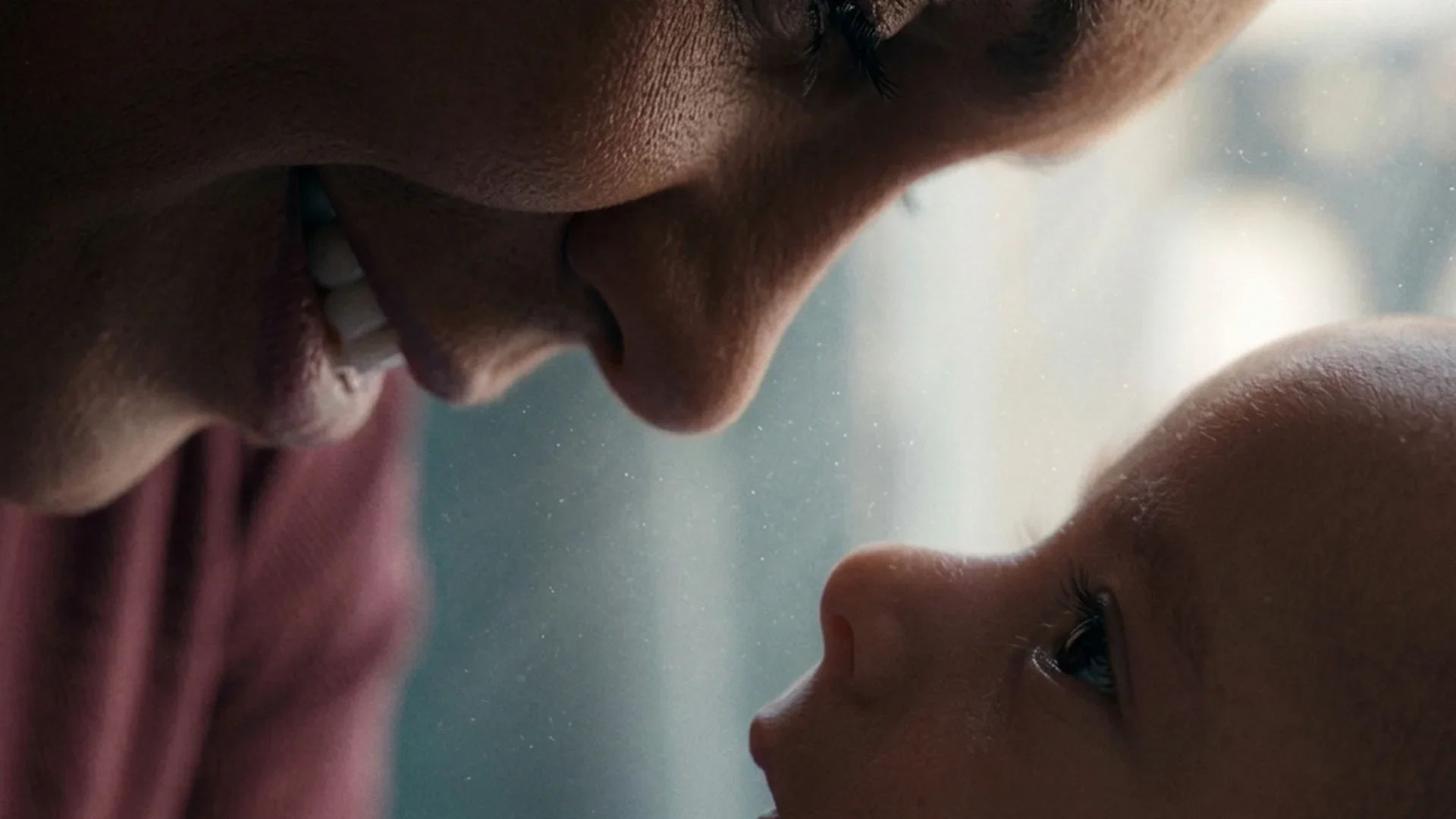 Jada leans her forehead close to her newborn son in Netflix's Nothing to Lose