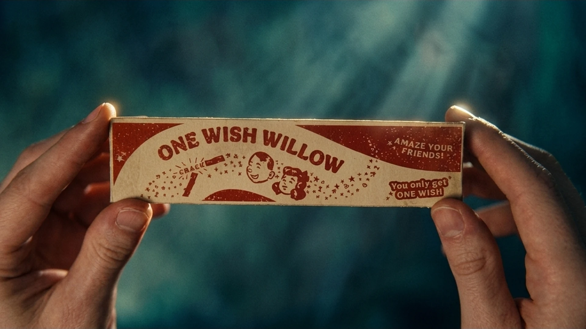 Close-up of the One-Wish Willow box, its label reading "you only get one wish," in the Obsession trailer