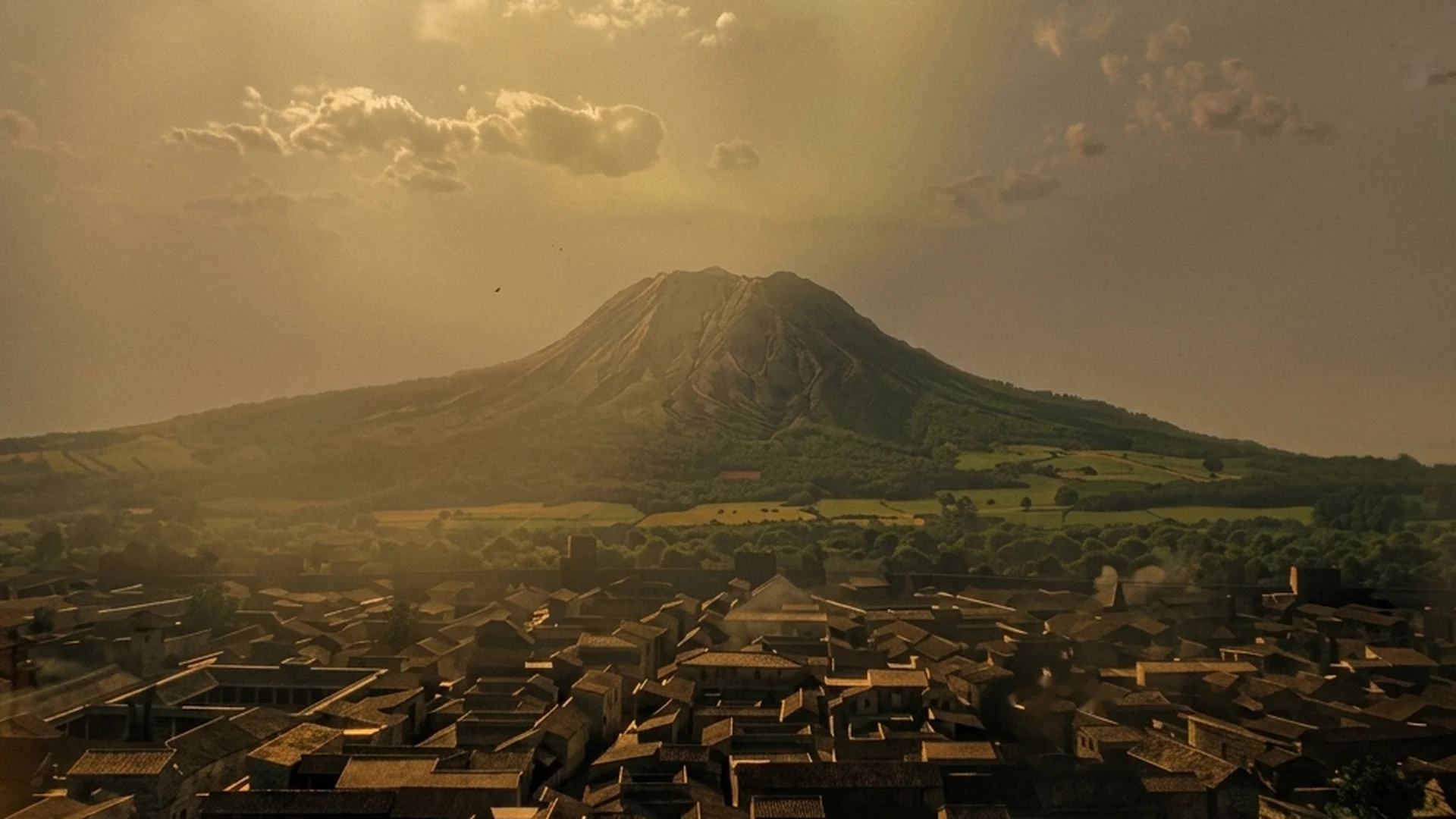 Mount Vesuvius rises behind the rooftops of ancient Pompeii in golden light