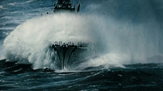 A warship in rough open seas