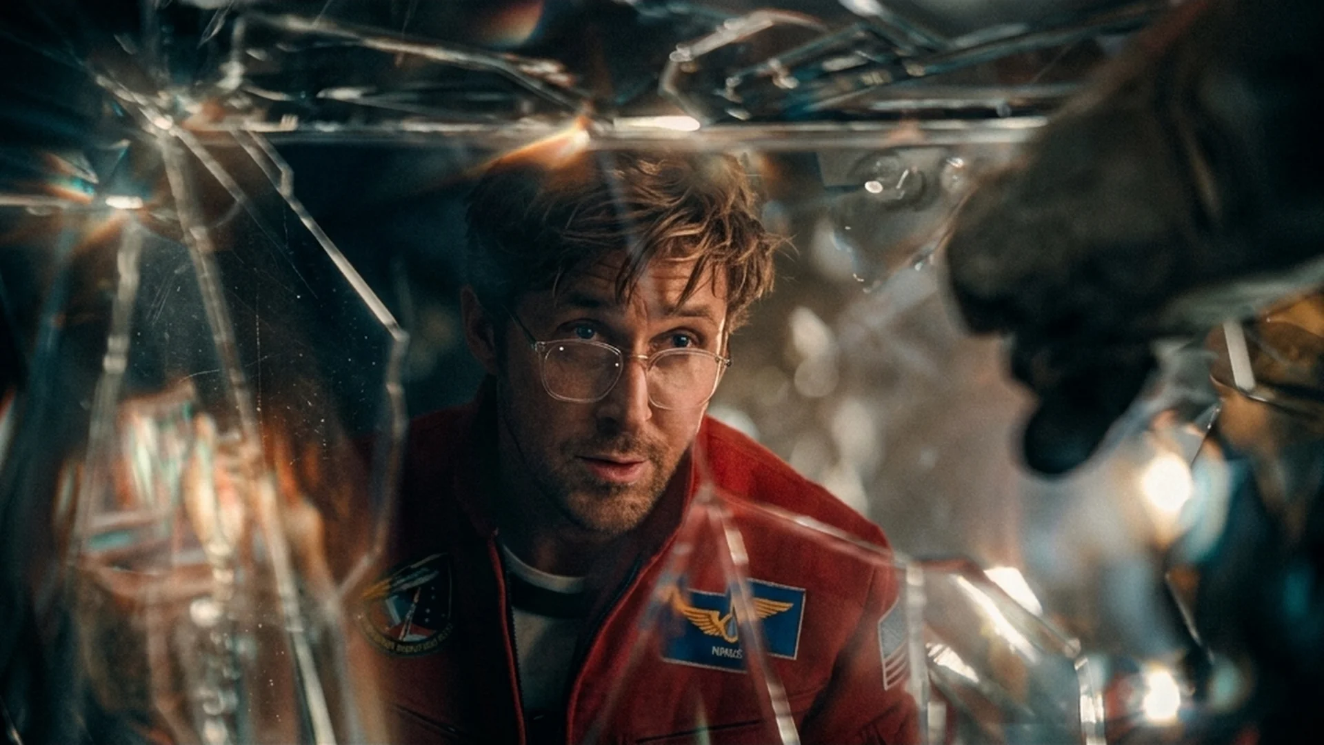 Grace facing Rocky, the Eridian, through the shared interface wall between their two chambers in the Project Hail Mary trailer