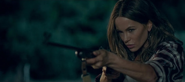 In the film, Maureen (Kate Beckinsale) takes up a gun to get her daughter back