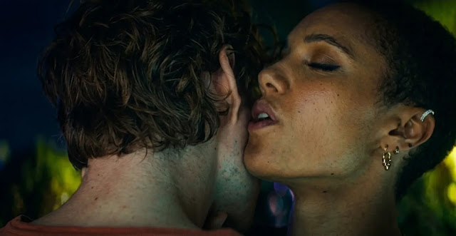A vampire sinking its fangs into a person's neck in Talamasca: The Secret Order