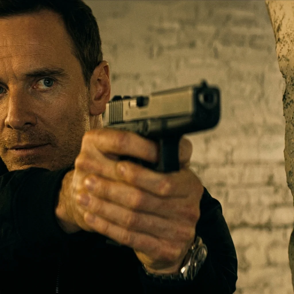 Martian aims a pistol in a dim underground passage, caught mid-mission in a moment of danger in The Agency