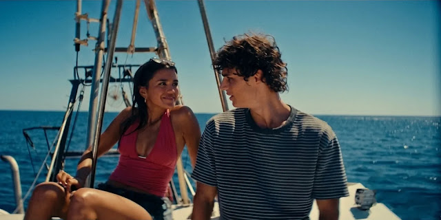 Ry (Maia Reficco) and Julián (Fernando Lindez) on a sailboat off the Mallorca coast in The Last Sunrise