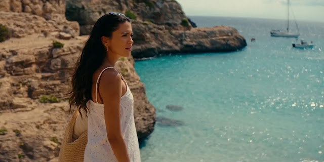 Ry (Maia Reficco) by a turquoise cove in Mallorca in The Last Sunrise