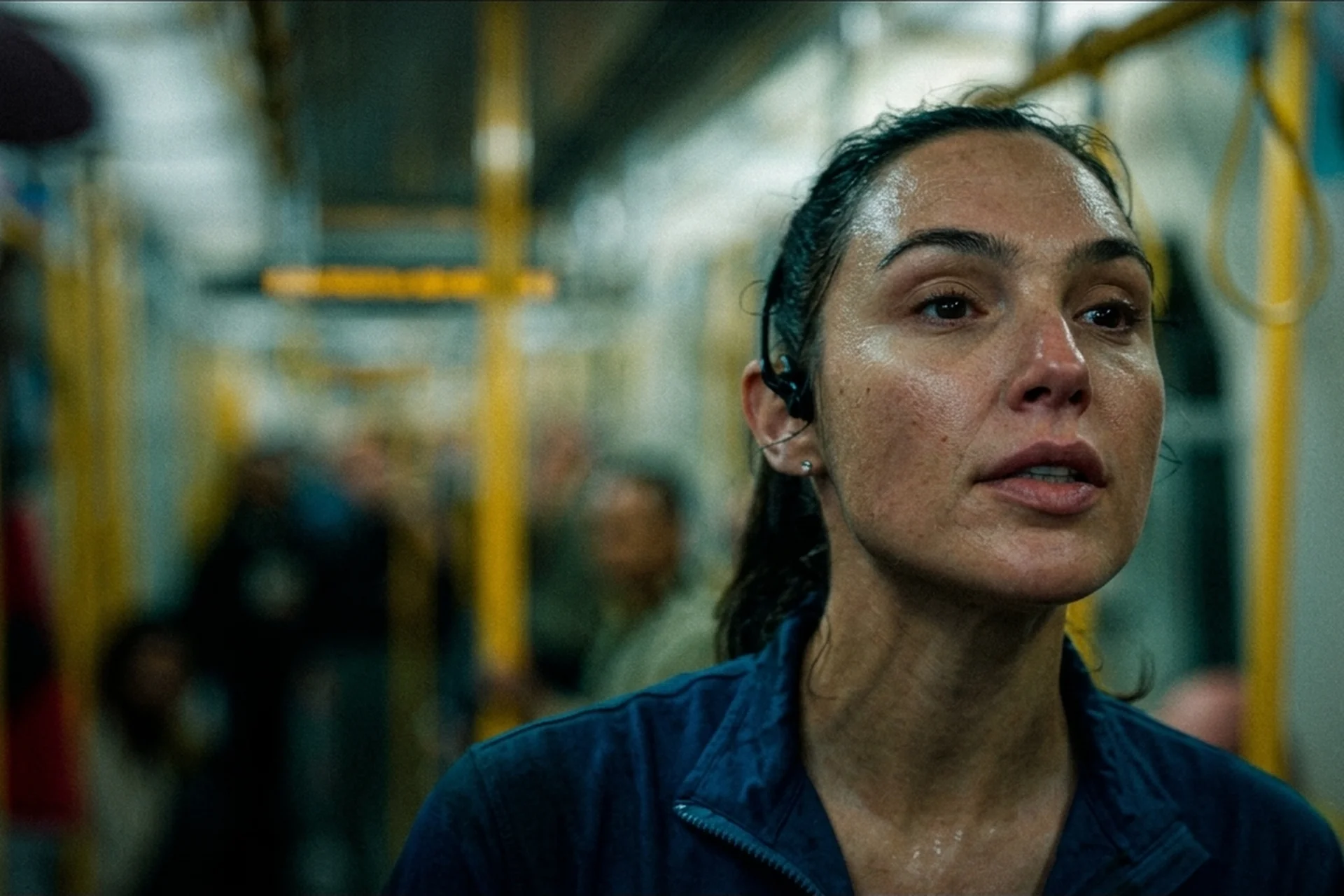 Maia riding a crowded London Underground train, out of contact with the Caller in The Runner