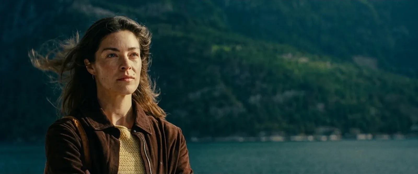 Louise (Natalie Madueno) on the Norwegian island, unsettled after a stranger calls her by another name
