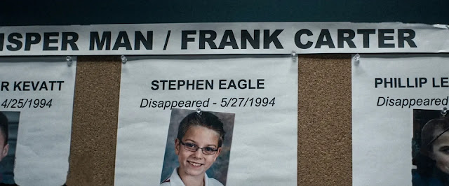 The case file for the original Whisper Man, Frank Carter, pinned with photographs of his child victims