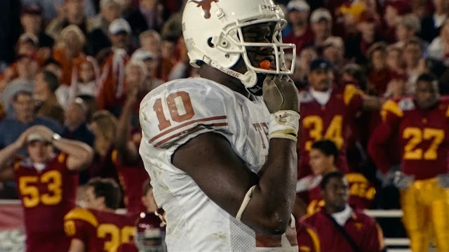 Archival footage of Vince Young in a Texas Longhorns uniform during his college career