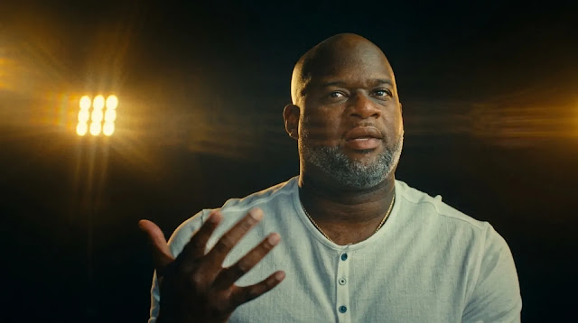 Vince Young looking reflective in a present-day interview in Untold: The Testimony of Vince Young